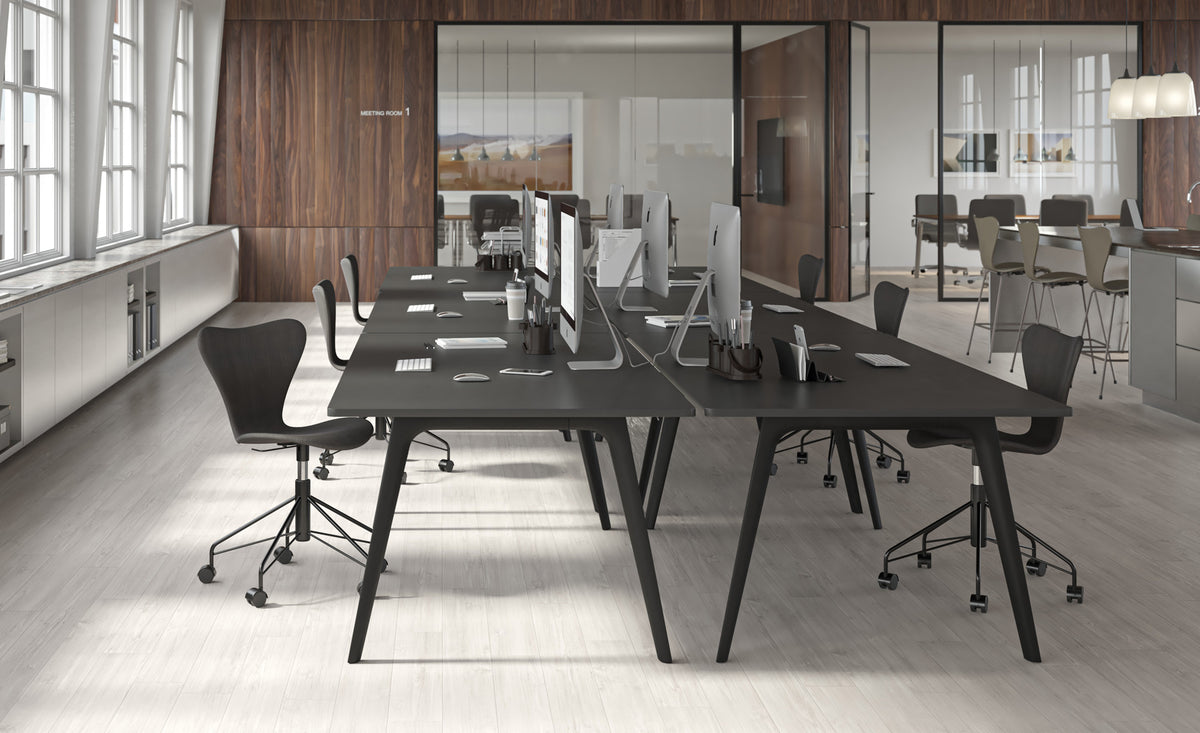 Series 7 Full Upholstery Swivel Chair by Fritz Hansen, showing series 7 full upholstery swivel chairs in live shot.