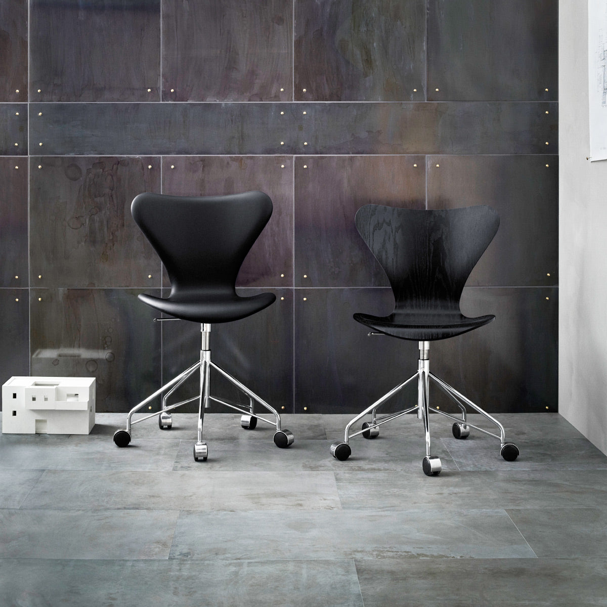 Series 7 Full Upholstery Swivel Chair by Fritz Hansen, showing series 7 full upholstery swivel chair in live shot.