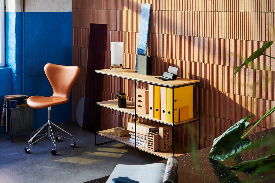 Series 7 Full Upholstery Swivel Chair by Fritz Hansen, showing series 7 full upholstery swivel chair in live shot.