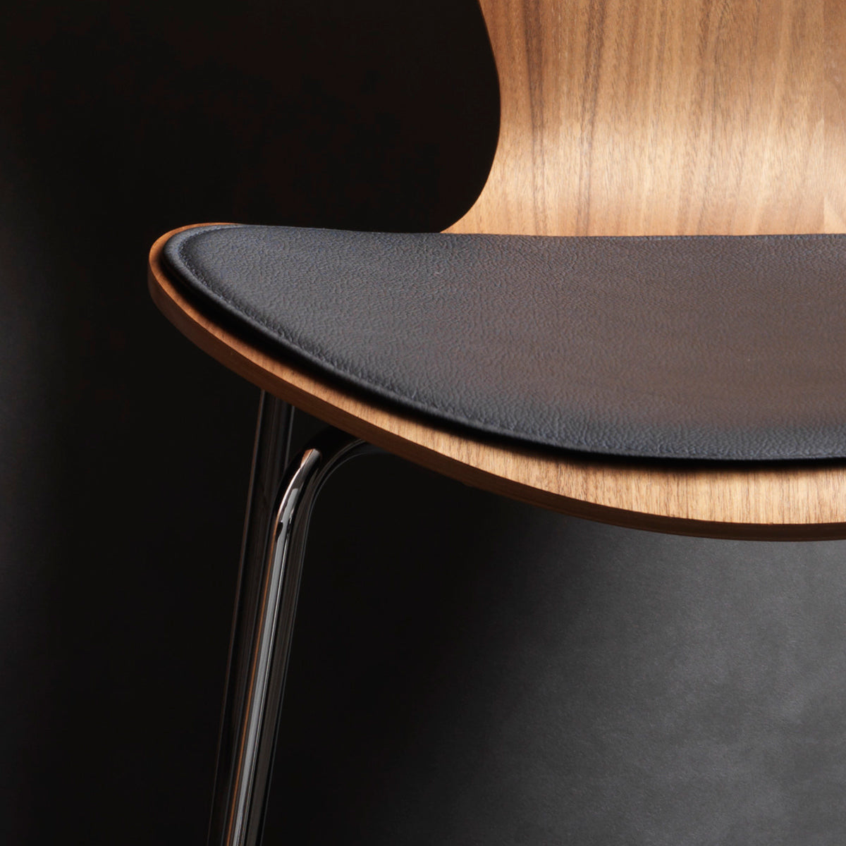 Series 7 Seat Cushion by Fritz Hansen, showing closeup view of series 7 seat cushion in live shot.