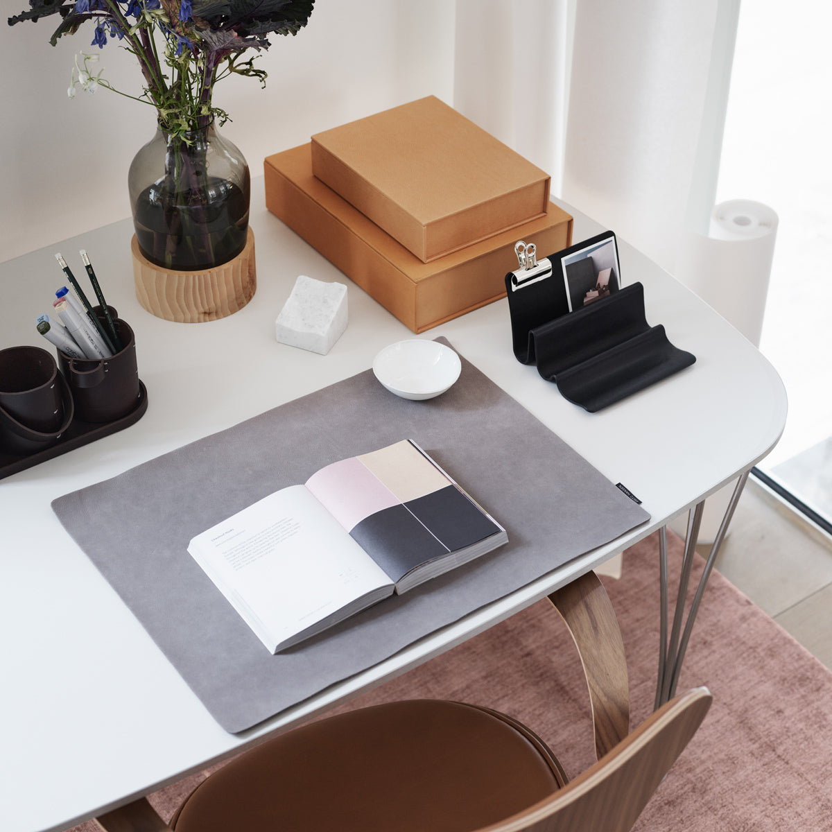 Series 7 Swivel Armchair by Fritz Hansen, showing closeup view of series 7 swivel armchair in live shot.
