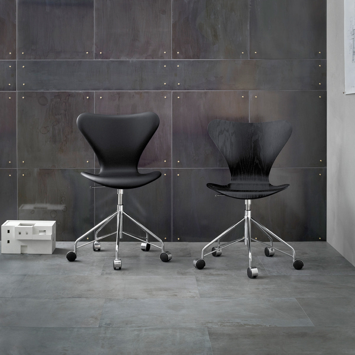 Series 7 Swivel Chair by Fritz Hansen, showing series 7 swivel chair in live shot.