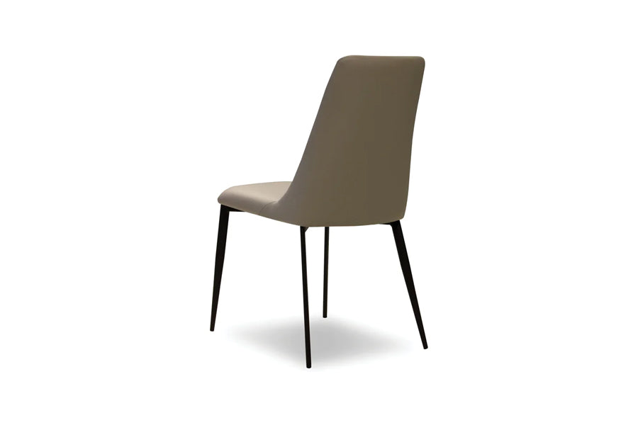 Seville Dining Chair by Mobital, showing back angle view of seville dining chair in taupe leatherette/matte black powder coated base.
