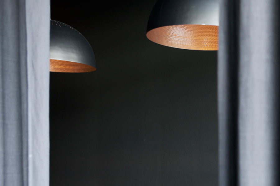 Shade Light Pendant by Mater, showing closeup view of shade light pendants in live shot.