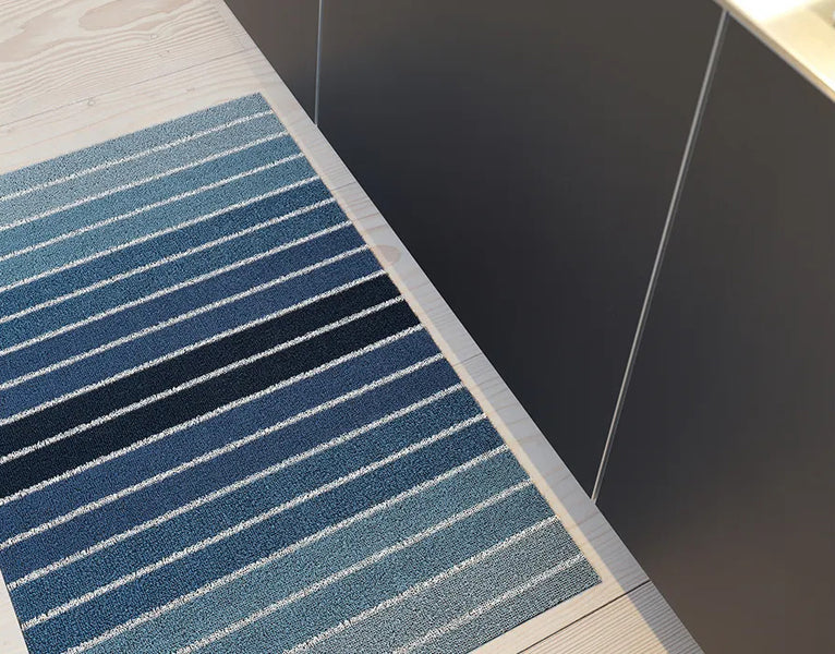 Shag Indoor/Outdoor Floormat by Chilewich, showing shag indoor/outdoor floormat in live shot.