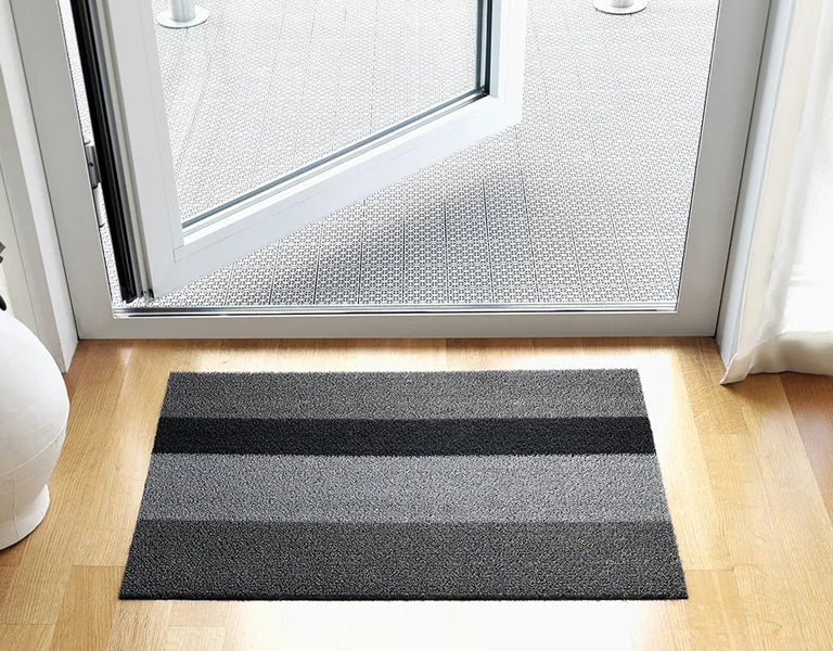 Shag Indoor/Outdoor Floormat by Chilewich, showing shag indoor/outdoor floormat in live shot.