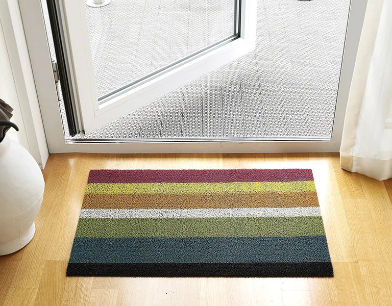 Shag Indoor/Outdoor Floormat by Chilewich, showing shag indoor/outdoor floormat in live shot.