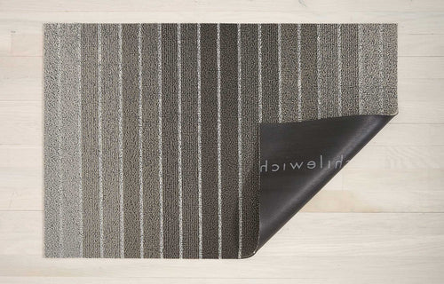 Shag Indoor/Outdoor Floormat by Chilewich - Block, Taupe Stripe.