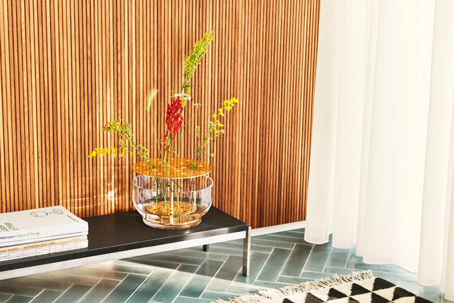 PK62 Side Table by Fritz Hansen, showing pk62 side table in live shot.