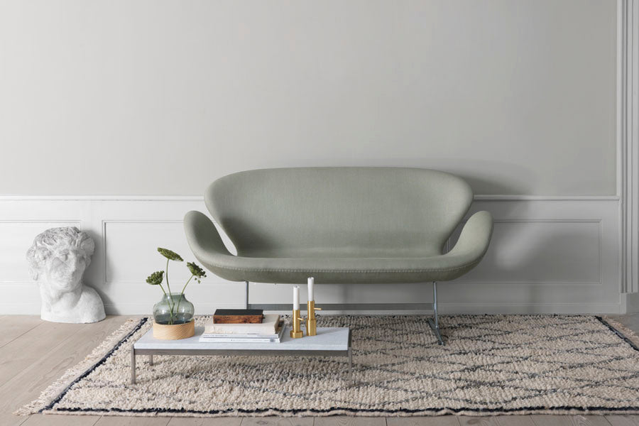 PK62 Side Table by Fritz Hansen, showing pk62 side table in live shot.
