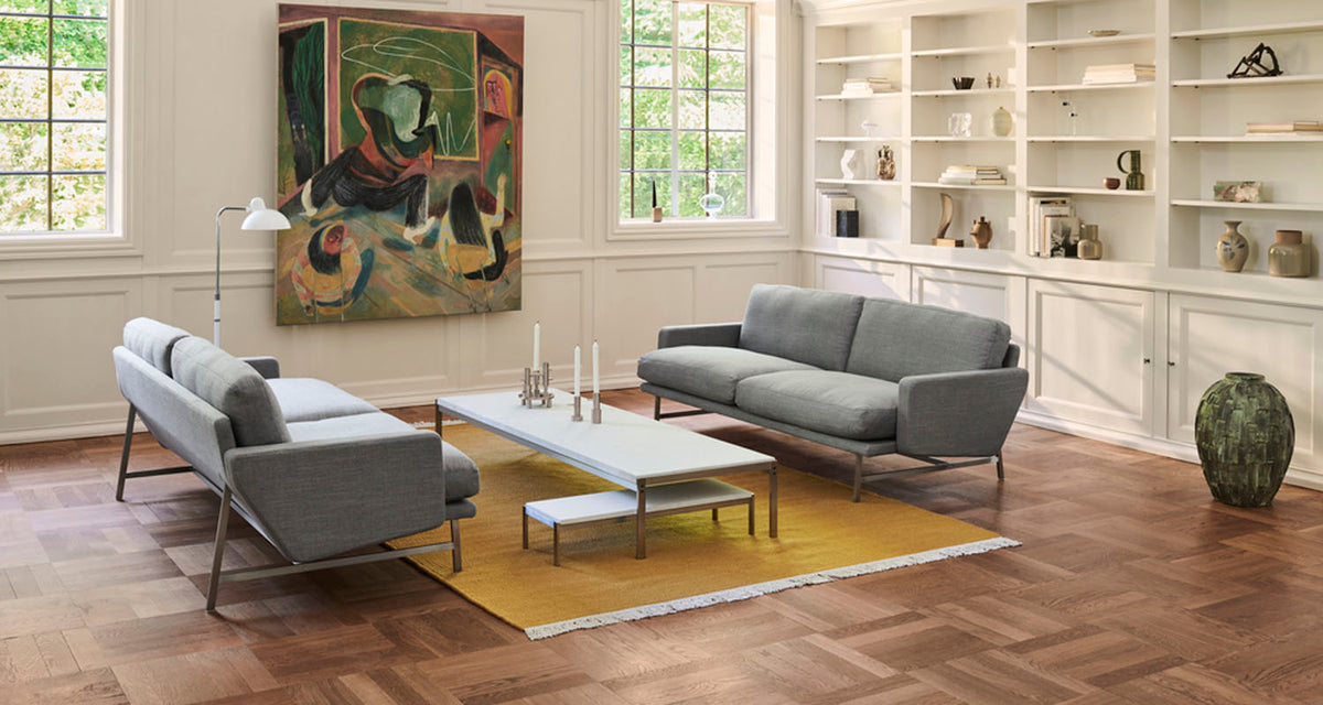 PK62 Side Table by Fritz Hansen, showing pk62 side table in live shot.