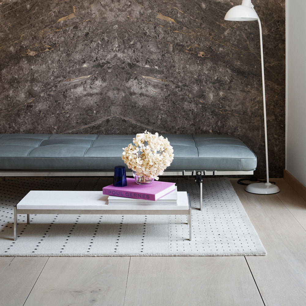 PK62 Side Table by Fritz Hansen, showing pk62 side table in live shot.