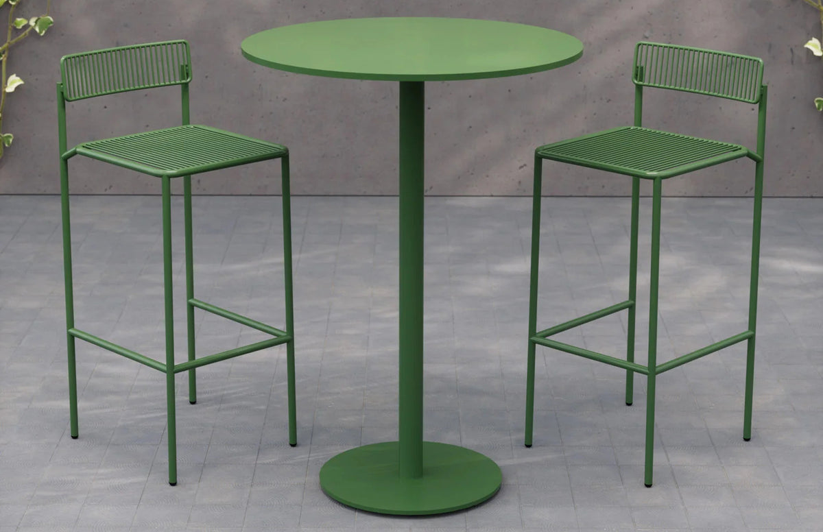 Simple Bar Table by Bend, showing simple bar table in live shot with bar chairs.