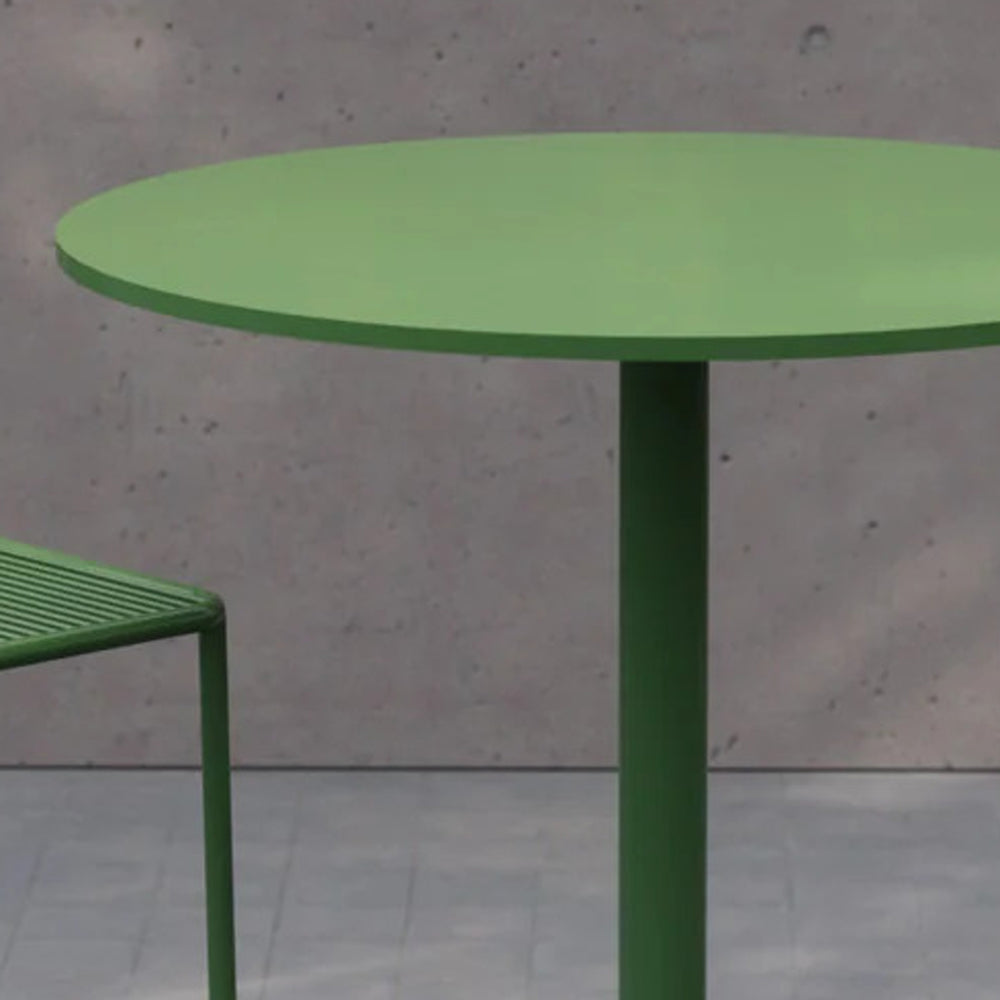 Simple Bar Table by Bend, showing closeup view of simple bar table in live shot with bar chairs.