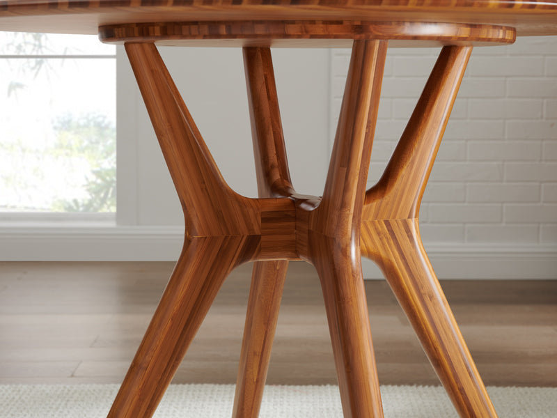Sitka Dining Table by Greenington, showing closeup view of sitka dining table in live shot.