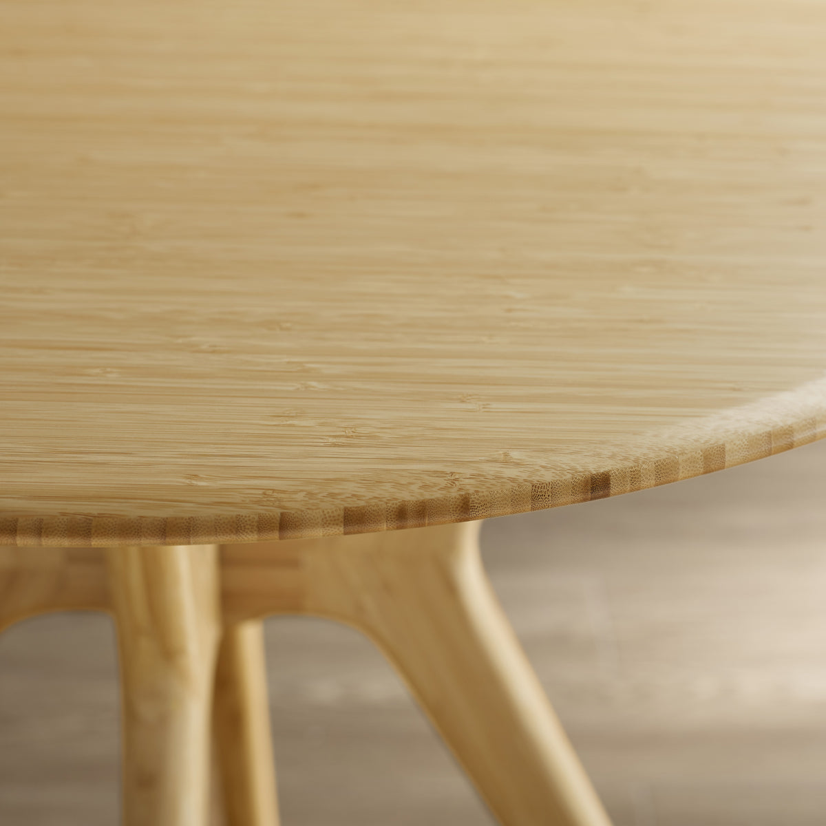 Sitka Dining Table by Greenington, showing closeup view of sitka dining table in live shot.