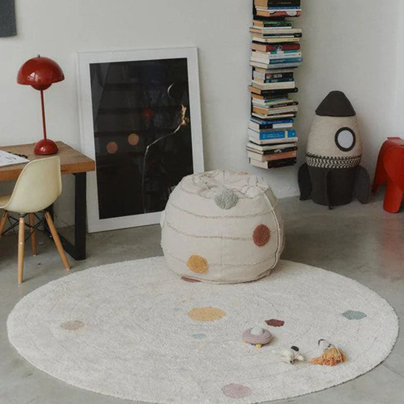 Solar System Pouf by Lorena Canals, showing solar system pouf in live shot.