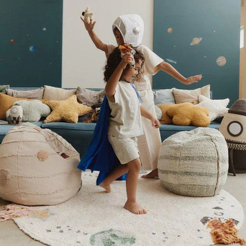Solar System Pouf by Lorena Canals, showing solar system pouf in live shot.
