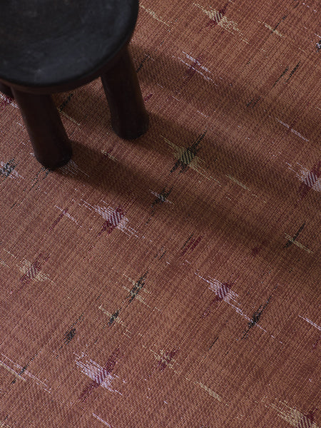 Spark Woven Floor Mat by Chilewich, showing closeup view of spark woven floor mat in live shot.