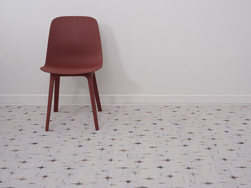 Spark Woven Floor Mat by Chilewich, showing closeup view of spark woven floor mat in live shot.
