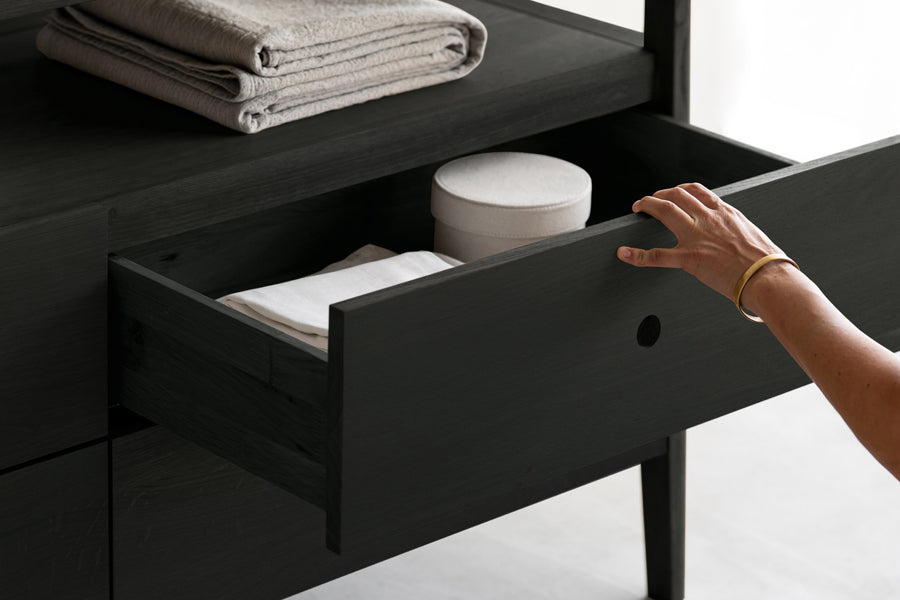 Spindle Dresser by Ethnicraft, showing closeup view of spindle dresser in live shot.