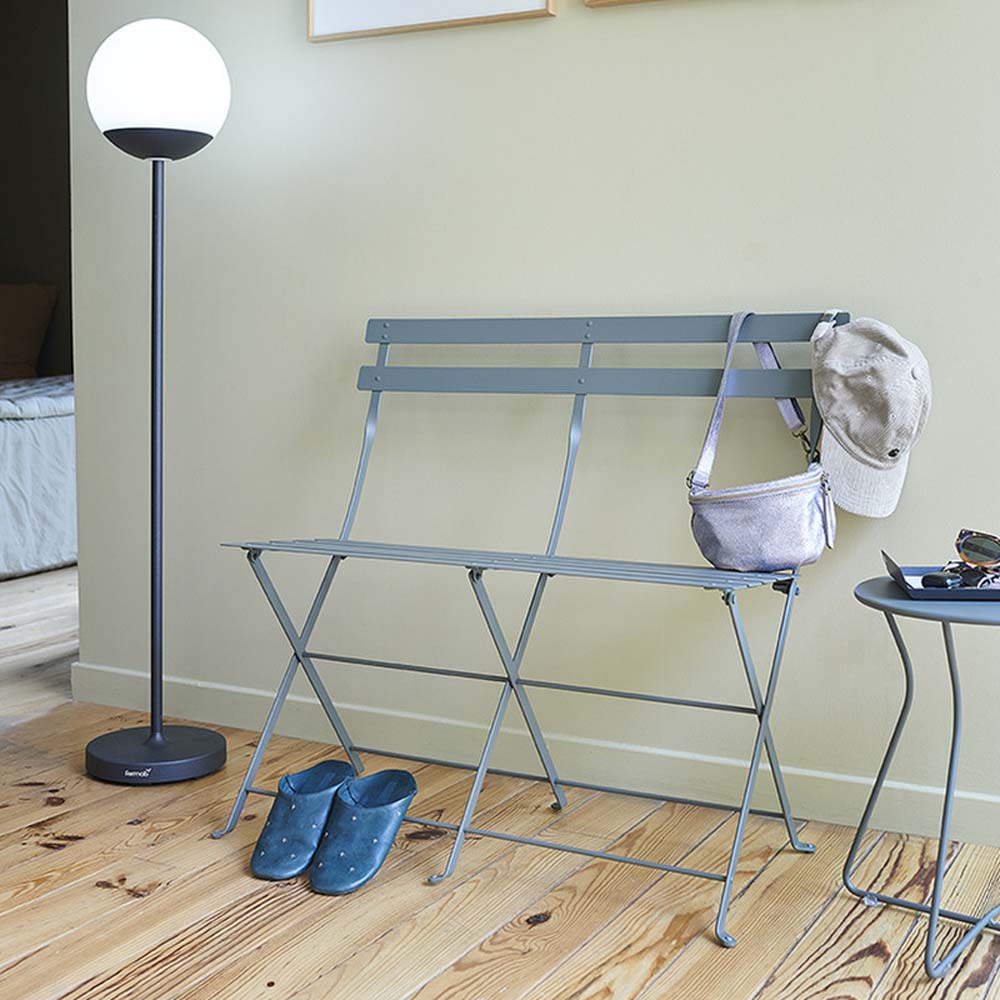 Bistro 2-Seater Bench by Fermob, showing bistro 2-seater bench in live shot.