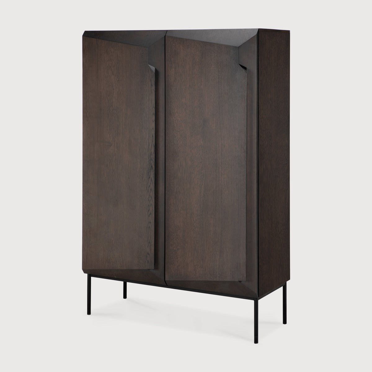 Stairs Cupboard by Ethnicraft, showing angle view of stairs cupboard in studio shot.