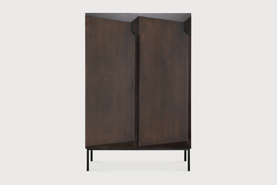 Stairs Cupboard by Ethnicraft, showing front view of stairs cupboard in studio shot.