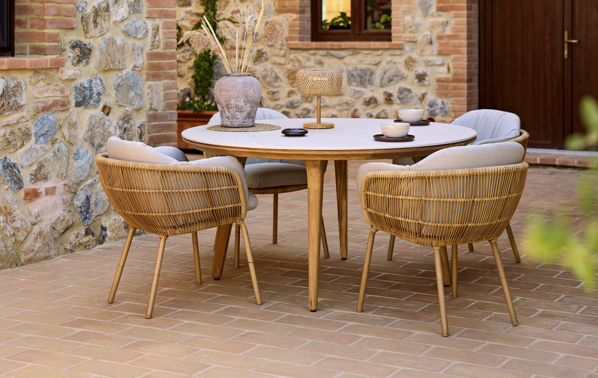 Stay Chair by Cane-Line, showing stay chairs in live shot.