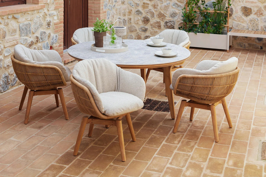 Stay Chair by Cane-Line, showing stay chairs in live shot.
