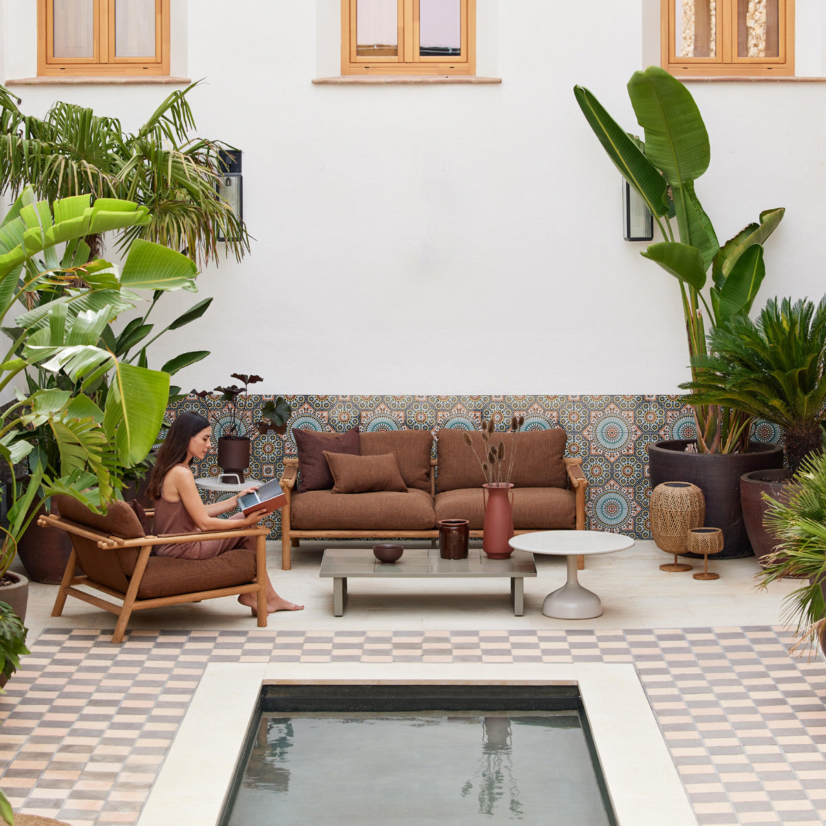 Sticks 2-Seater Sofa by Cane-Line, showing sticks 2-seater sofa in live shot.