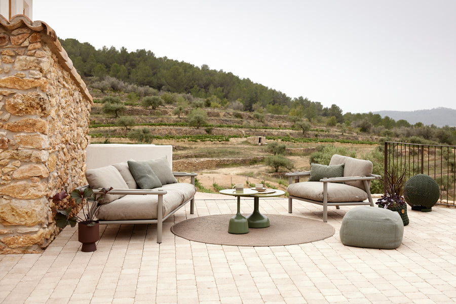 Sticks 2-Seater Sofa by Cane-Line, showing sticks 2-seater sofa in live shot.