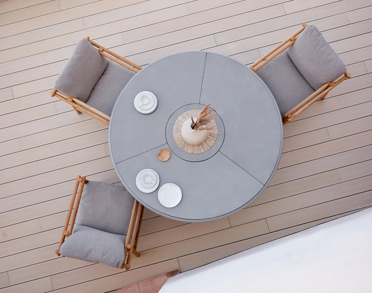 Sticks Armchair by Cane-Line, showing sticks armchairs in live shot.