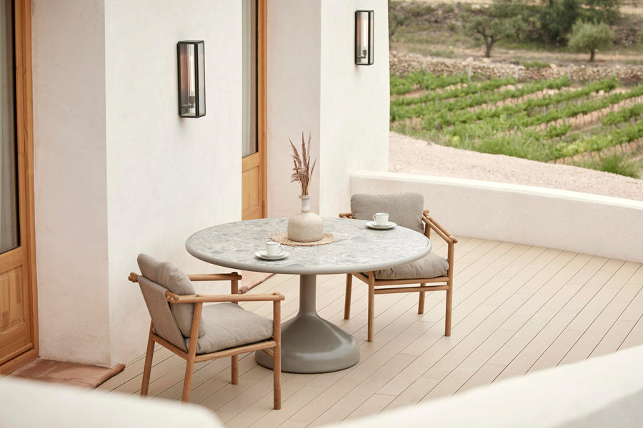Sticks Armchair by Cane-Line, showing sticks armchairs in live shot.