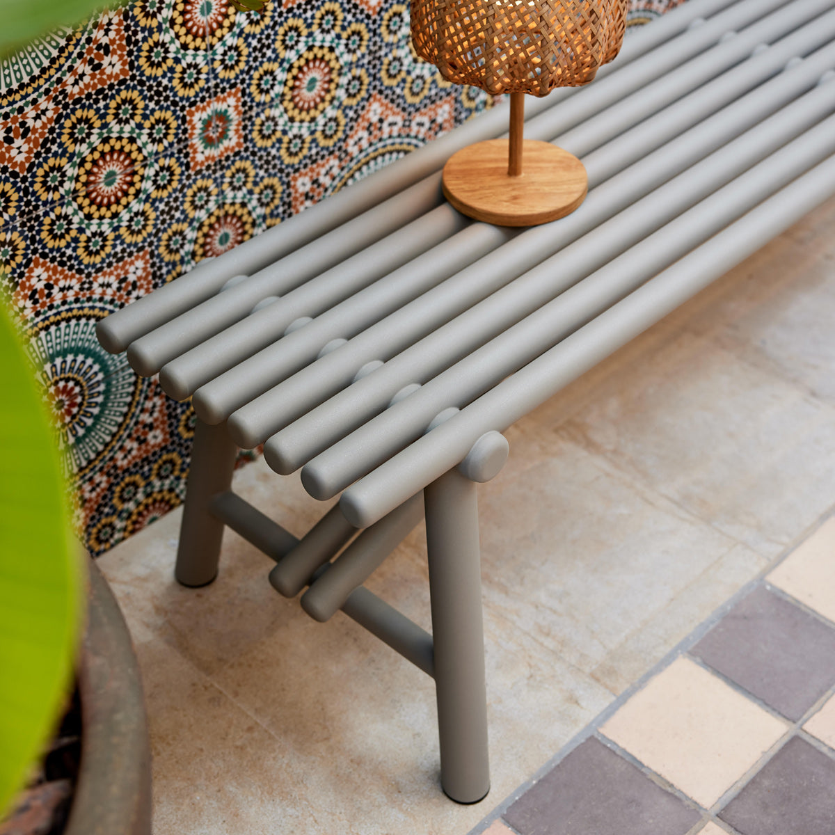 Sticks Bench by Cane-Line, showing closeup view of sticks bench in live shot.