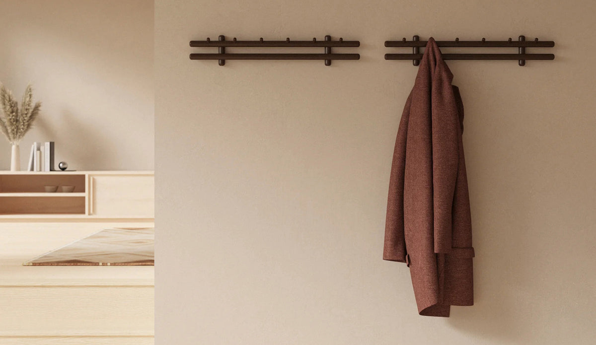 Sticks Coat Rack by Cane-Line, showing sticks coat racks in live shot.