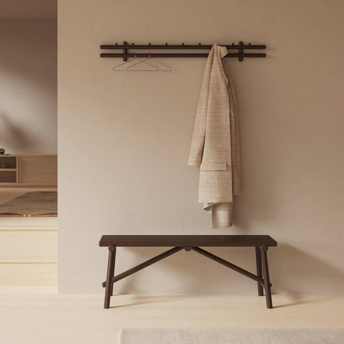 Sticks Coat Rack by Cane-Line, showing sticks coat rack in live shot.