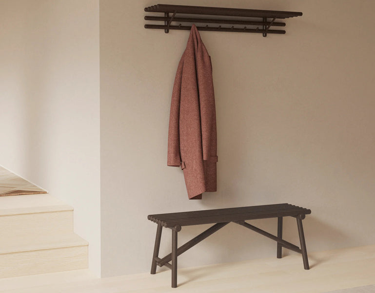 Sticks Coat Rack by Cane-Line, showing sticks coat rack in live shot.
