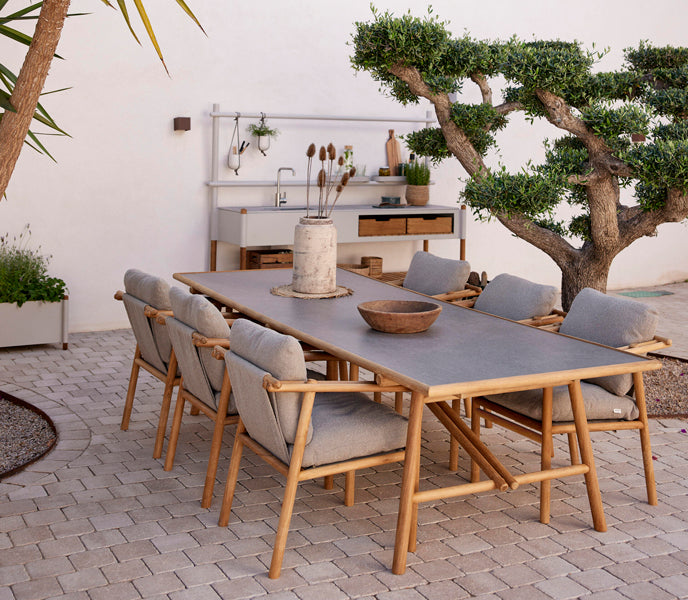 Sticks Kitchen Module with Teak Shelf by Cane-Line, showing sticks kitchen module with teak shelf in live shot.