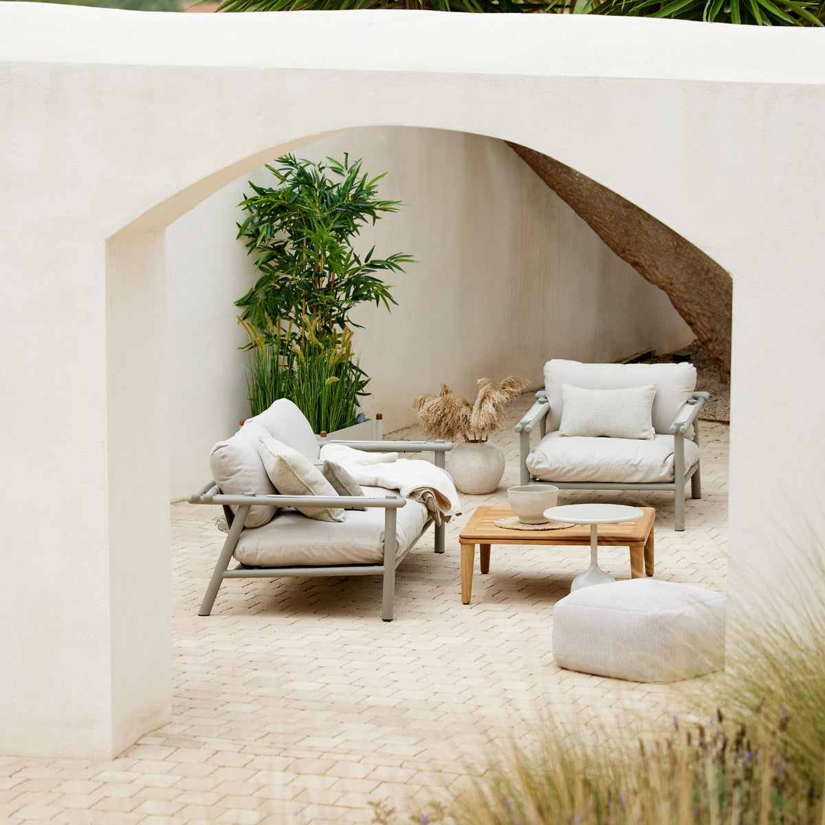Sticks Lounge Chair by Cane-Line, showing sticks lounge chair in live shot.