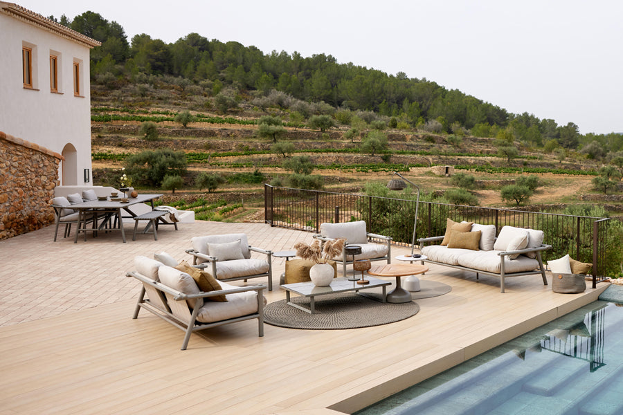 Sticks Lounge Chair by Cane-Line, showing sticks lounge chairs in live shot.