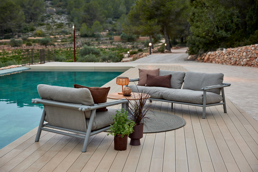 Sticks Lounge Chair by Cane-Line, showing sticks lounge chair in live shot.