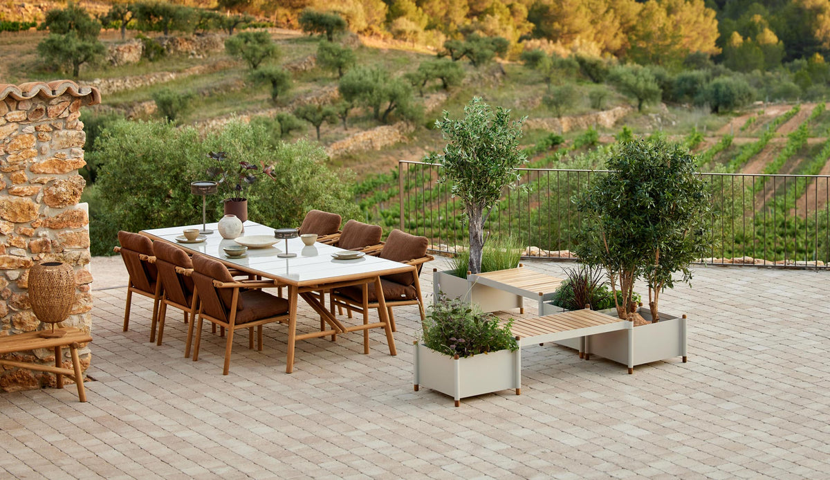 Sticks Planter by Cane-Line, showing sticks planters in live shot.