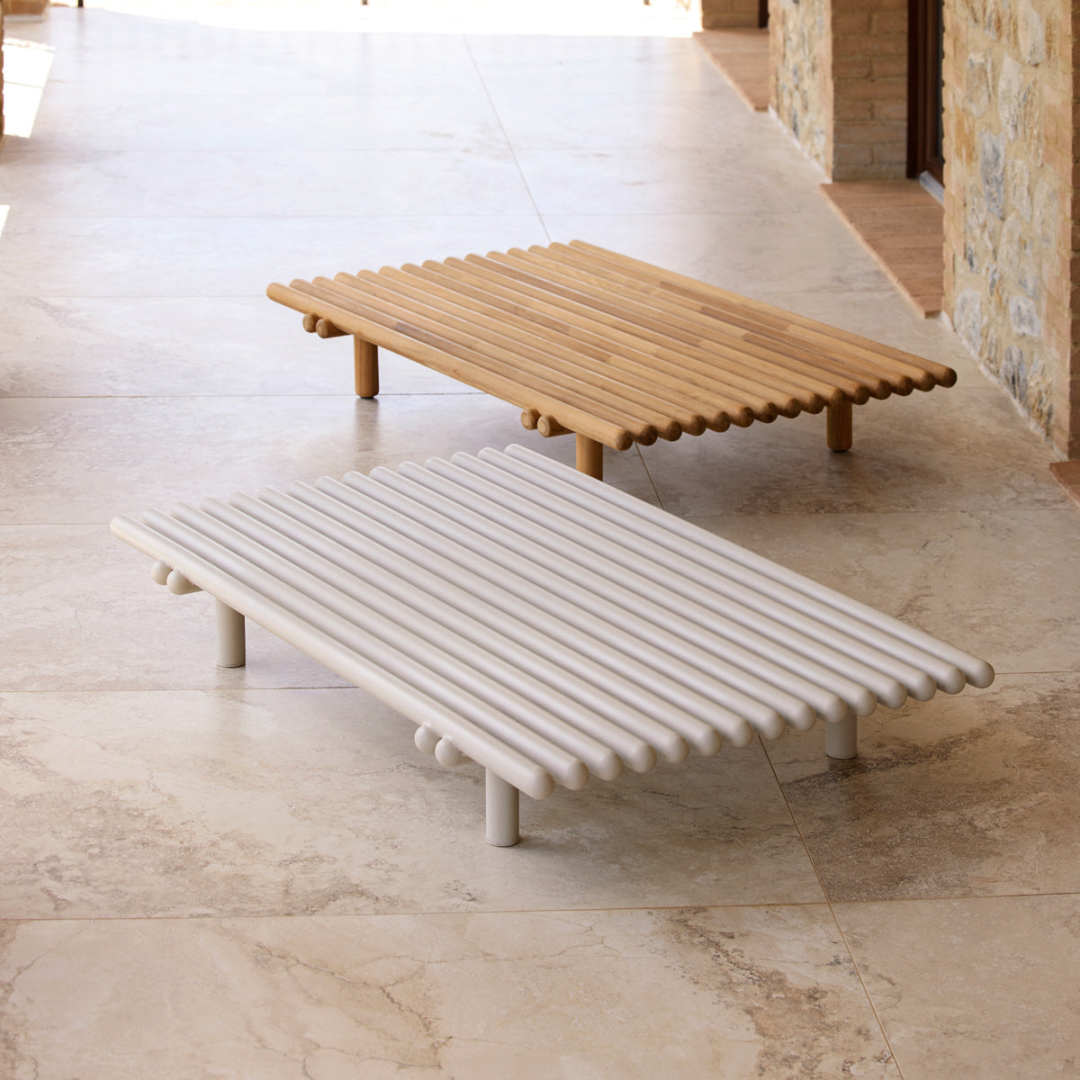 Sticks Platform Coffee Table by Cane-Line, showing sticks platform coffee tables in live shot.