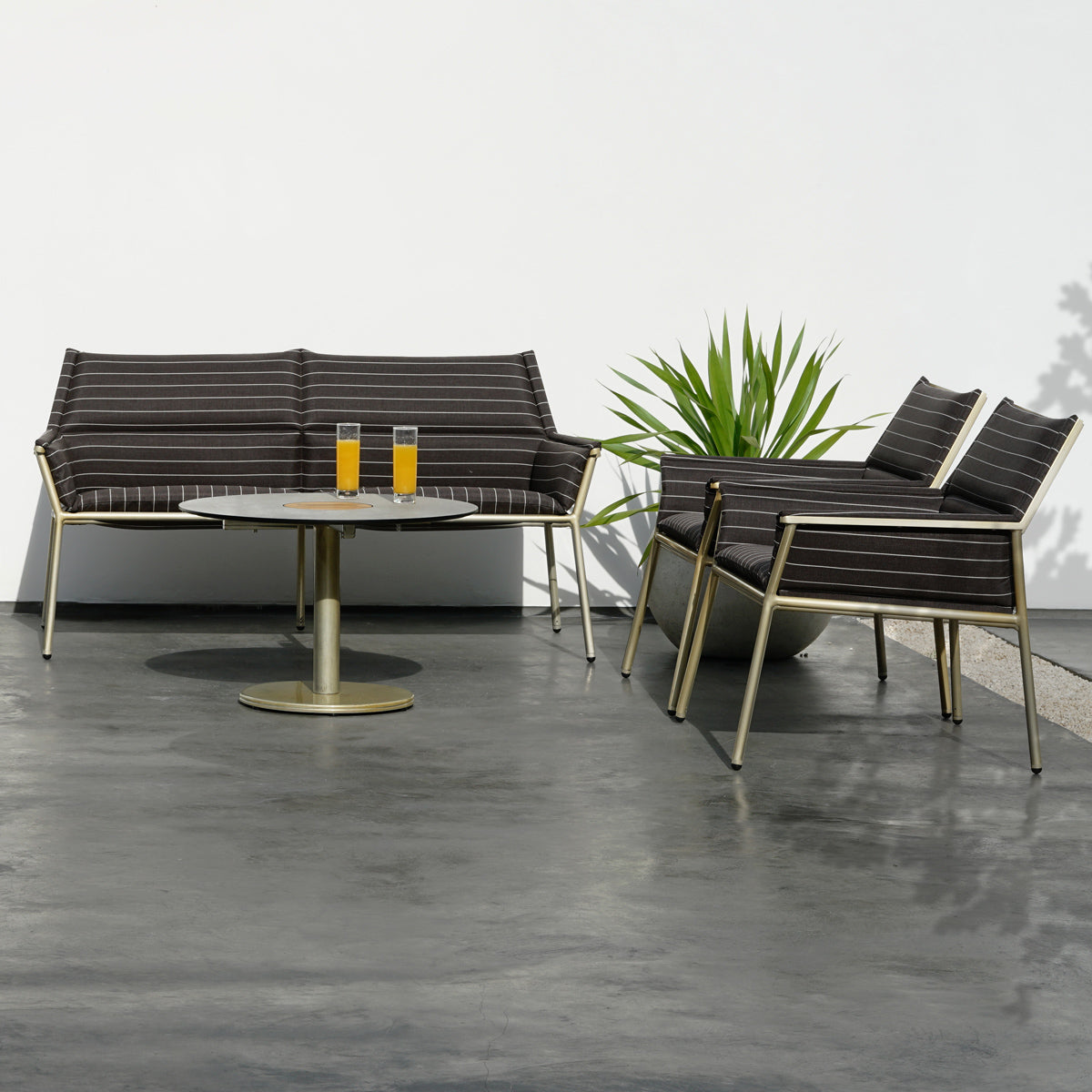 Stizzy Large Pedestal Casual Table by Mamagreen, showing stizzy large pedestal casual table in live shot.