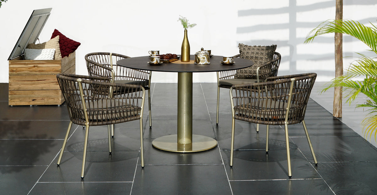 Stizzy Large Pedestal Dining Table by Mamagreen, showing stizzy large pedestal dining table in live shot.