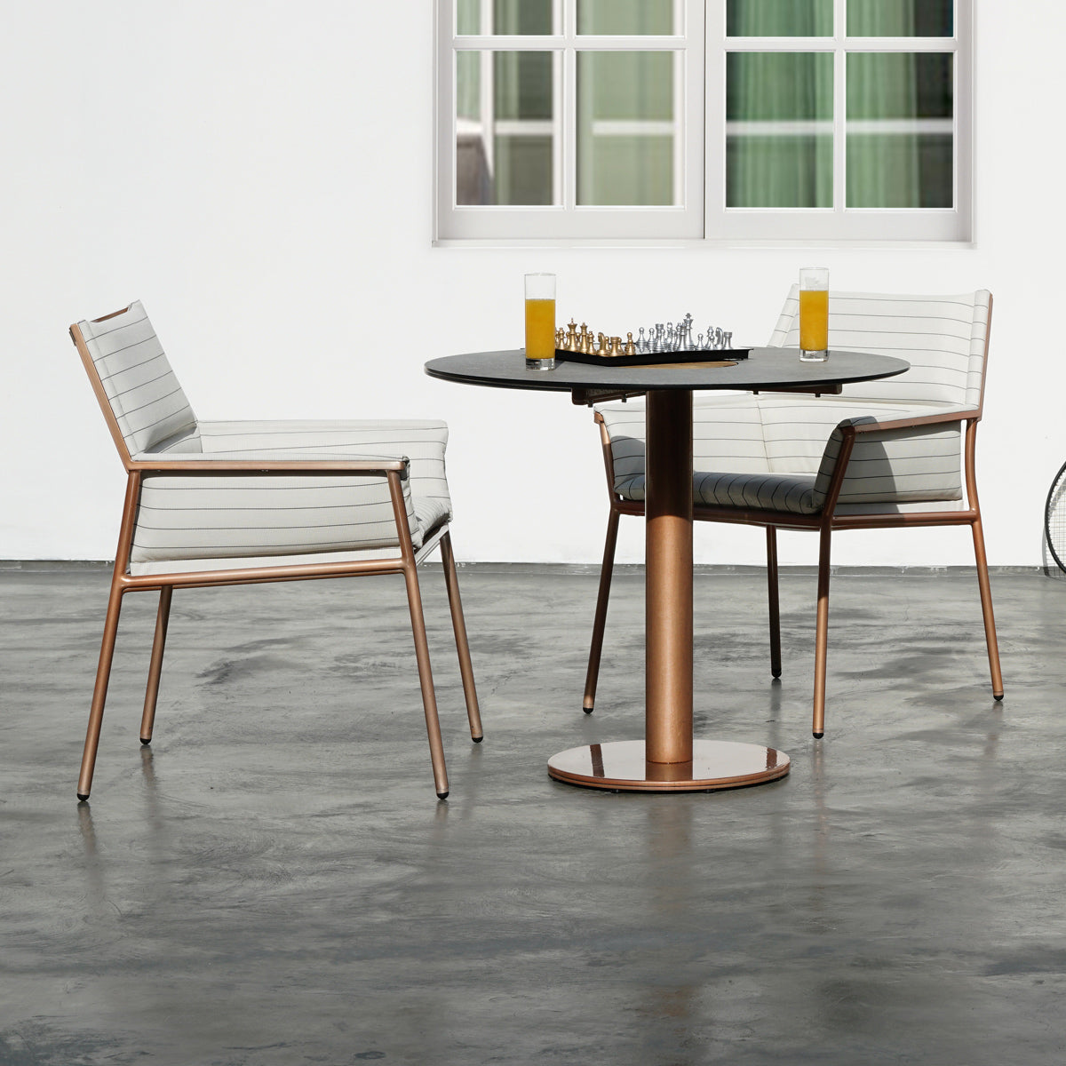 Stizzy Large Pedestal Dining Table by Mamagreen, showing stizzy large pedestal dining table in live shot.