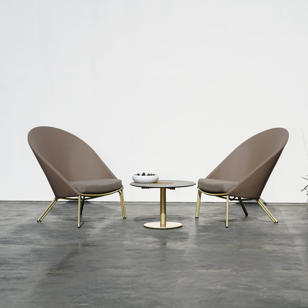 Stizzy Large Pedestal Low Table by Mamagreen, showing stizzy large pedestal low table in live shot.