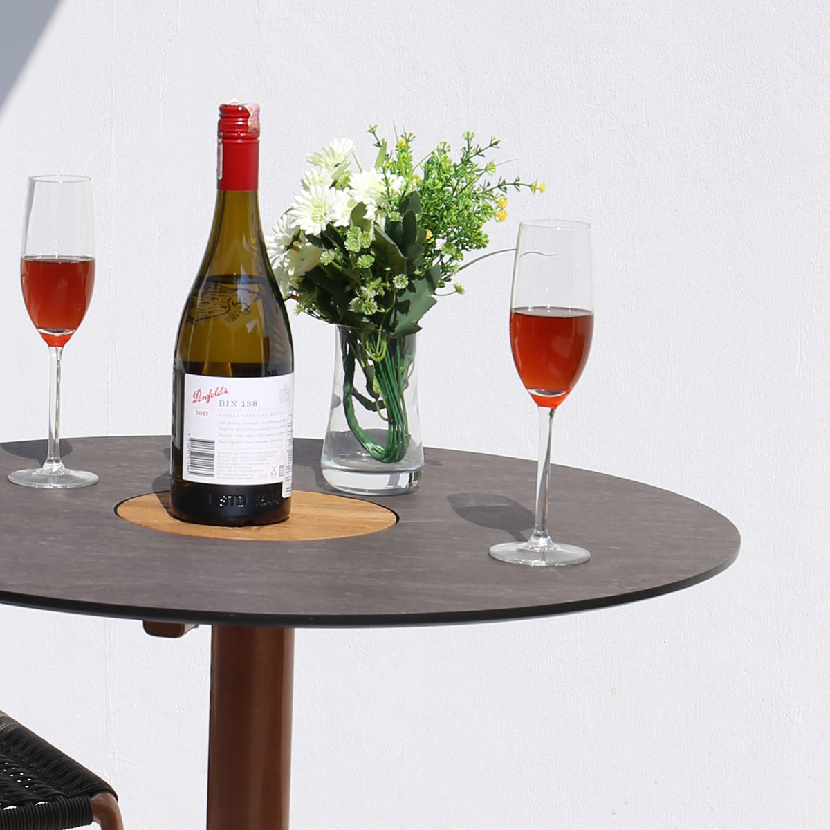 Stizzy Small Pedestal Casual Table by Mamagreen, showing closeup view of stizzy small pedestal casual table in live shot.