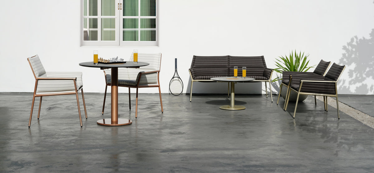 Stizzy Small Pedestal Dining Table by Mamagreen, showing stizzy small pedestal dining table in live shot.